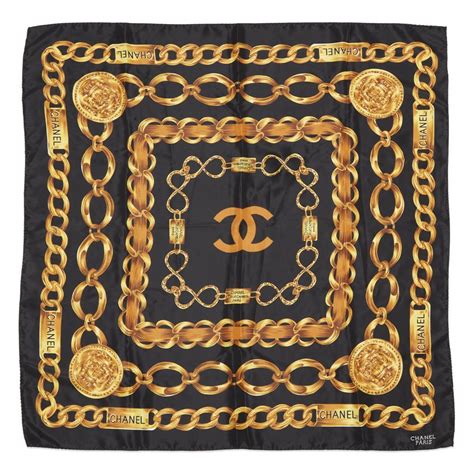 chanel black and gold scarf.